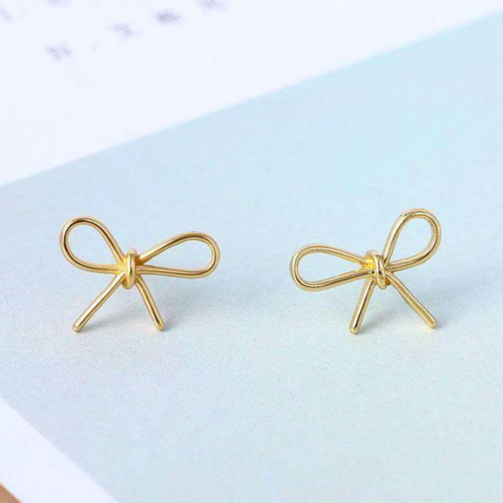 Kate Spade earrings gold bowtie earrings